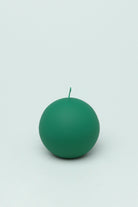 Henry Velvet Matte Soft Touch Pillar Candle in Emerald Green — lifestyle view, G Decor