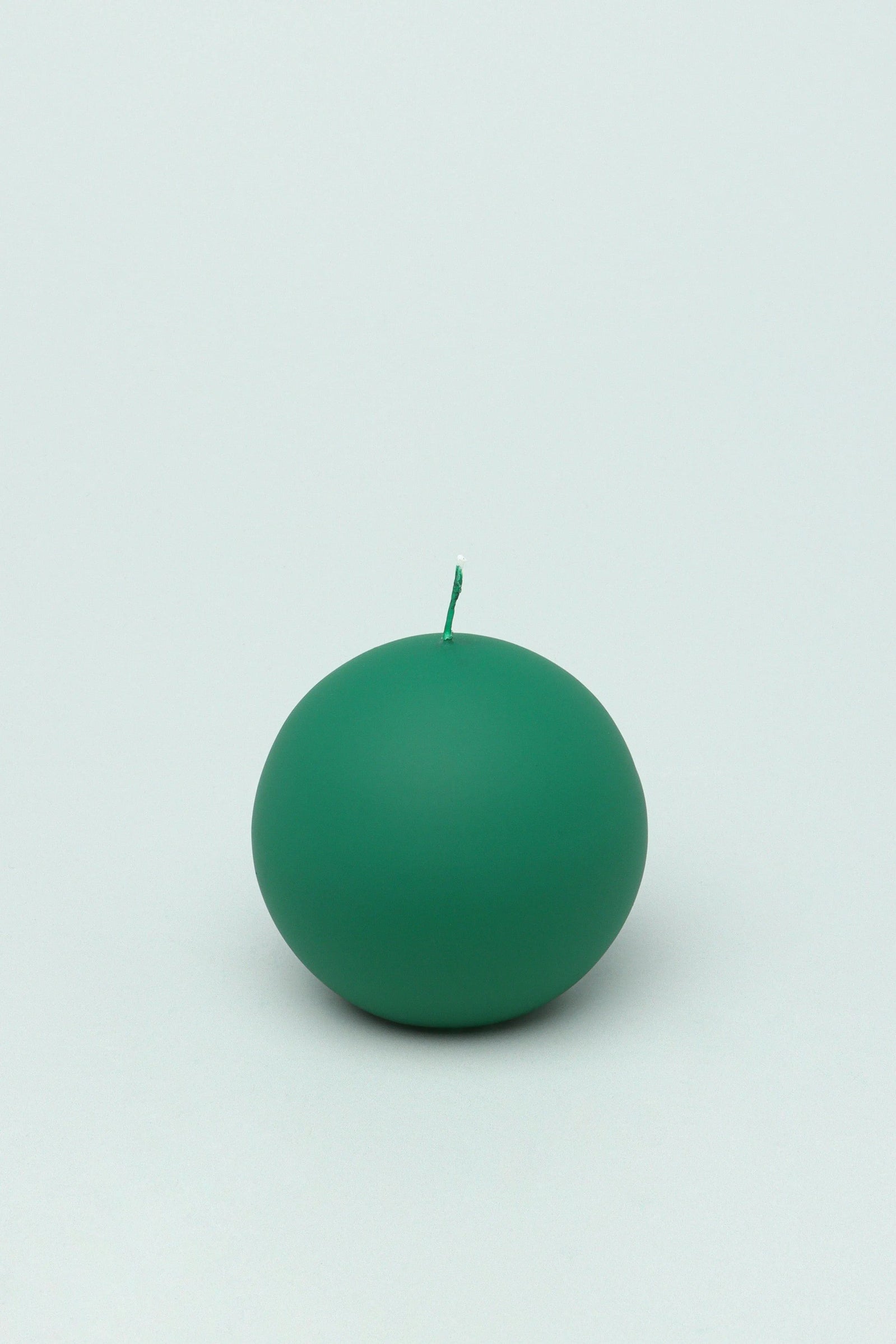 Henry Velvet Matte Soft Touch Pillar Candle in Emerald Green — lifestyle view, G Decor