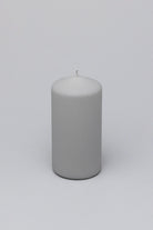 Henry Velvet Matte Soft Touch Pillar Candle in Light Grey — close-up view, G Decor