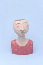 Familia Sculpted Face Ceramic Planter and Vase Collection — lifestyle view, G Decor