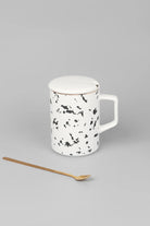 Roberto Nordic Monochrome Mug with Lid and Spoon — lifestyle view, G Decor