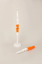 Twist and Pop Pair of White and Orange Spiral Twisted Taper Candles — G Decor