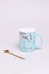 Eleonora Gold Marble Ceramic Mug with Lid and Spoon — lifestyle view, G Decor