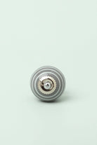 White Striped Ceramic Cabinet Knob in Pastel Grey and Mint — close-up view, G Decor