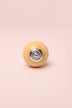 White Striped Hand-Painted Ceramic Cabinet Knob in Pink and Yellow — close-up view, G Decor