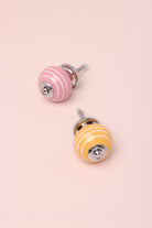 White Striped Handcrafted Ceramic Door Knob In Pink And Yellow Colours - G Decor